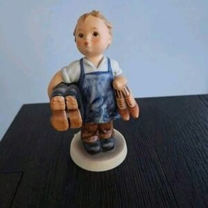 Goebel Figurine with Blue and White Details